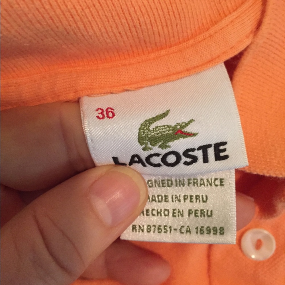 Lacoste women’s polo size 40 melon shirt sleeve like new